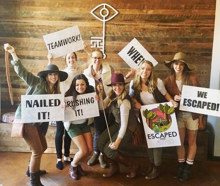 Photo of a team in costume after escaping the Temple